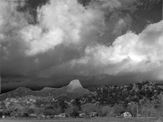 Clouds Over Thumb Butte in Black and White